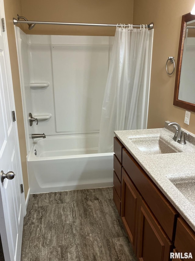 bathroom with vanity and shower / tub combo