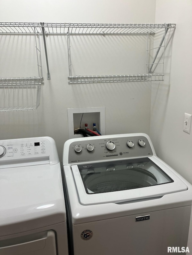 laundry area with washer and clothes dryer