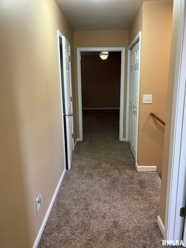 corridor featuring carpet floors