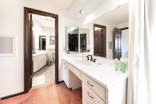 bathroom with tile floors and oversized vanity