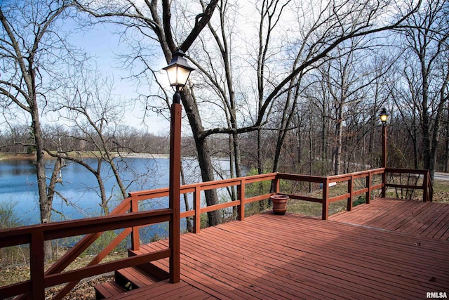 deck featuring a water view