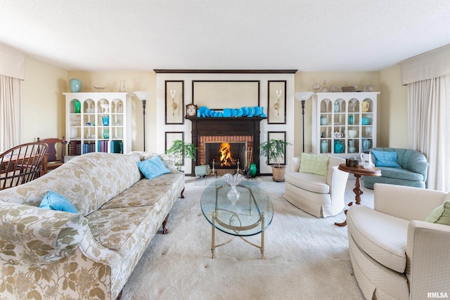 living room featuring a fireplace and light colored carpet