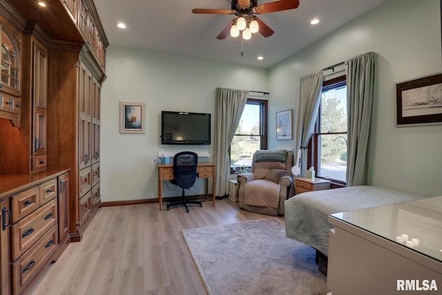 bedroom featuring ceiling fan and light hardwood / wood-style flooring