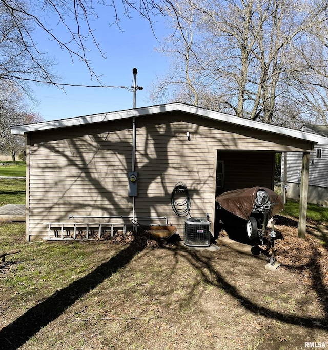 view of home's exterior with central AC unit