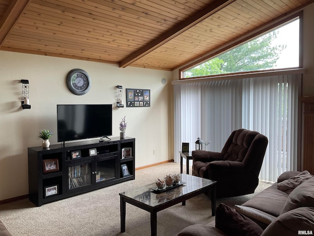 living room featuring lofted ceiling with beams, wooden ceiling, and carpet flooring