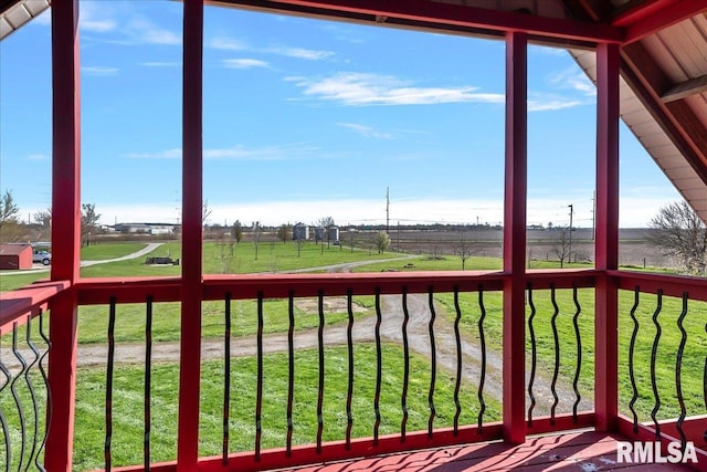 exterior space with a rural view