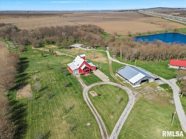 drone / aerial view featuring a water view and a rural view