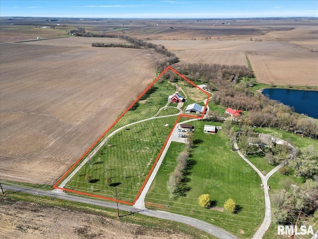 aerial view featuring a water view and a rural view