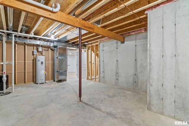 basement featuring water heater and heating unit