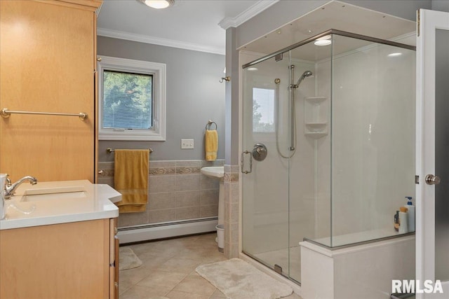 bathroom featuring walk in shower, a baseboard heating unit, tile patterned floors, vanity, and ornamental molding