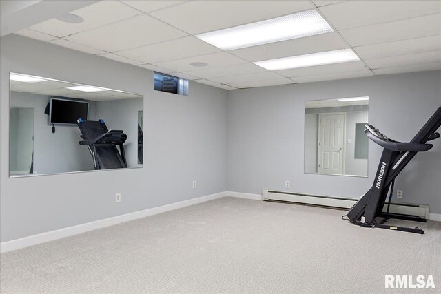 exercise area featuring a drop ceiling and carpet floors