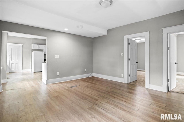 empty room with light wood-type flooring