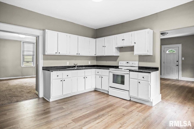 kitchen featuring white cabinetry, sink, light wood-type flooring, and white electric range