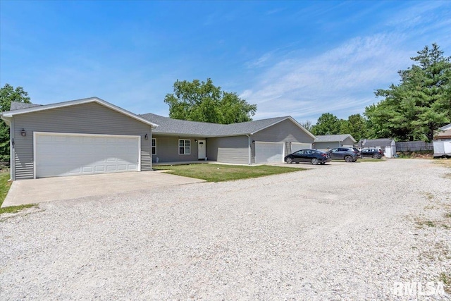 single story home featuring a garage