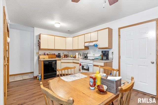 kitchen with light wood-type flooring, a textured ceiling, sink, dishwasher, and white range with gas stovetop