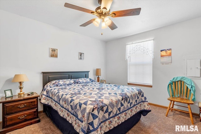 bedroom featuring ceiling fan and carpet floors