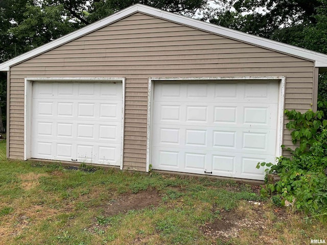 garage with wood walls