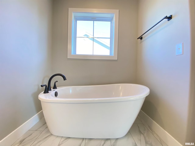 bathroom featuring a tub