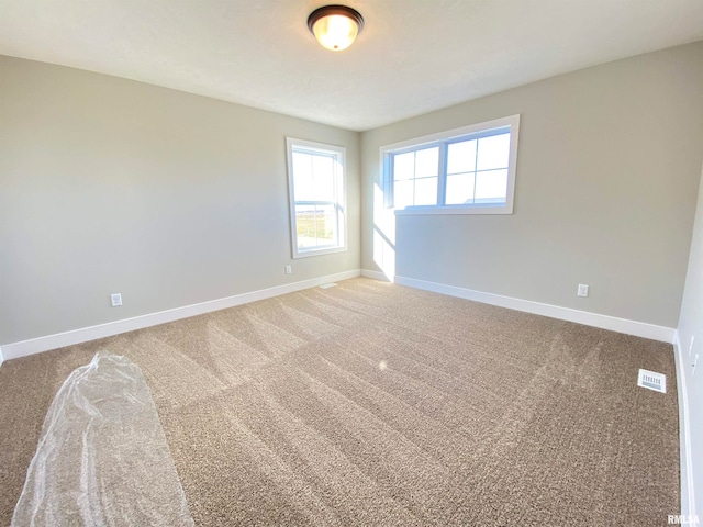 view of carpeted spare room