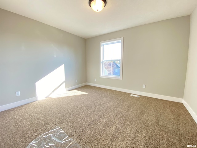 empty room featuring carpet