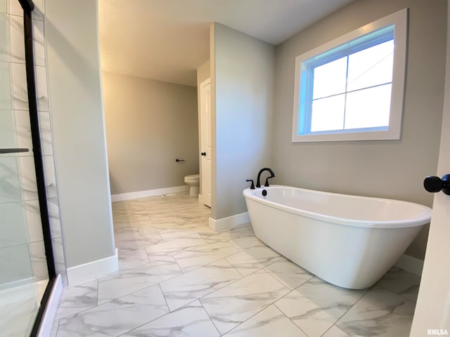 bathroom with shower with separate bathtub and toilet