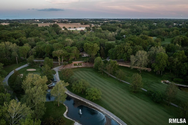 aerial view at dusk with a water view