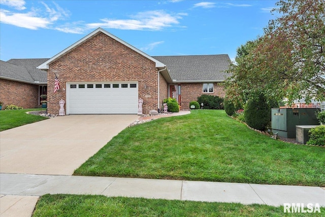 5001 Wildcat Run, Springfield, IL 62711 - view of front of home featuring a garage, a front lawn, brick siding, and concrete driveway