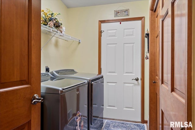 laundry area featuring washing machine and dryer