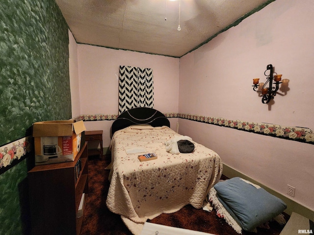 bedroom featuring a textured ceiling