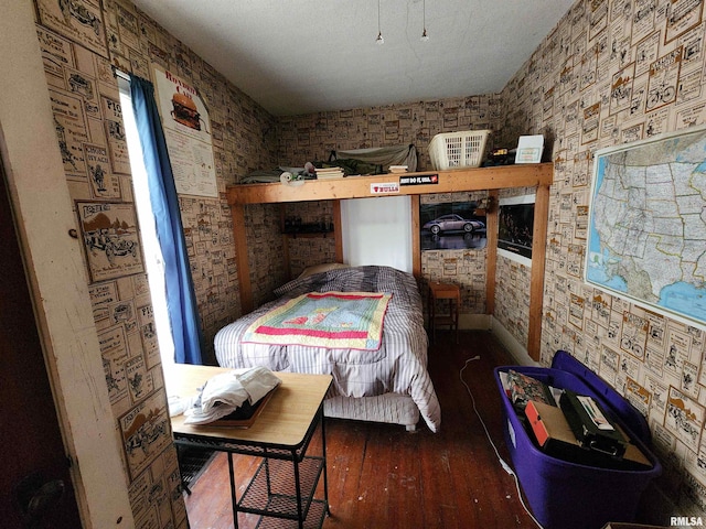 bedroom featuring hardwood / wood-style floors