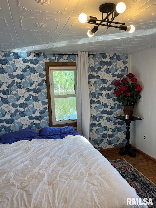 bedroom featuring hardwood / wood-style floors