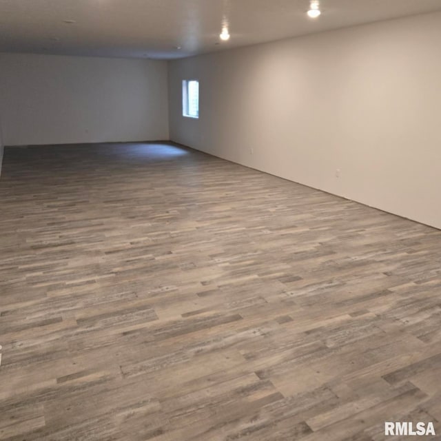 unfurnished room featuring hardwood / wood-style floors