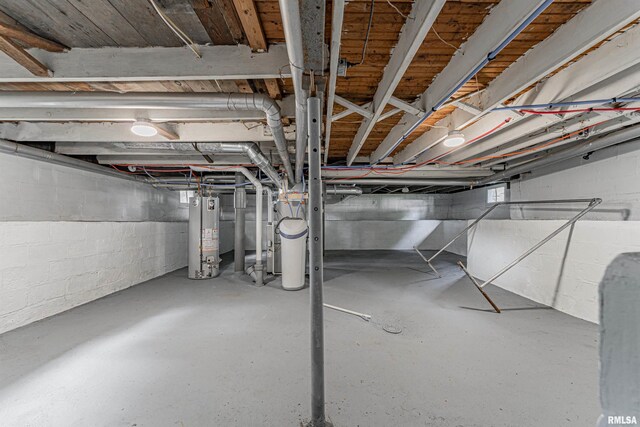 basement featuring water heater