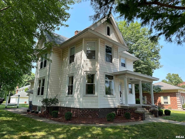 view of front facade featuring a garage and a front lawn