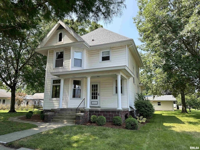 212 S Broadway St, Stronghurst, IL 61480 - view of front of home with covered porch and a front lawn