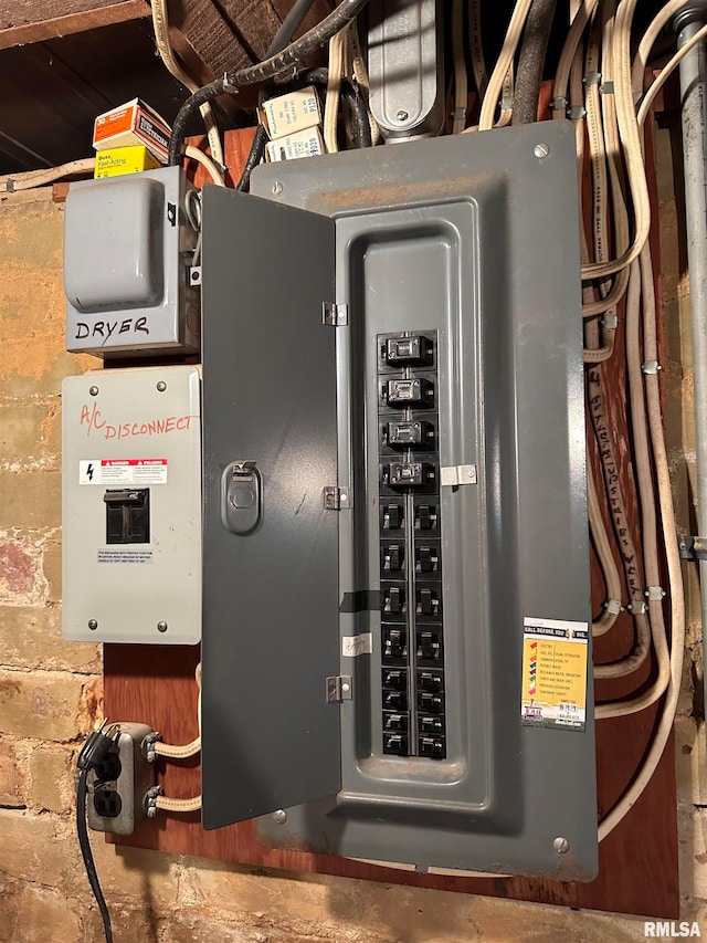 utility room featuring electric panel