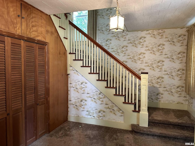 212 S Broadway St, Stronghurst, IL 61480 - stairs with wallpapered walls, carpet floors, and baseboards