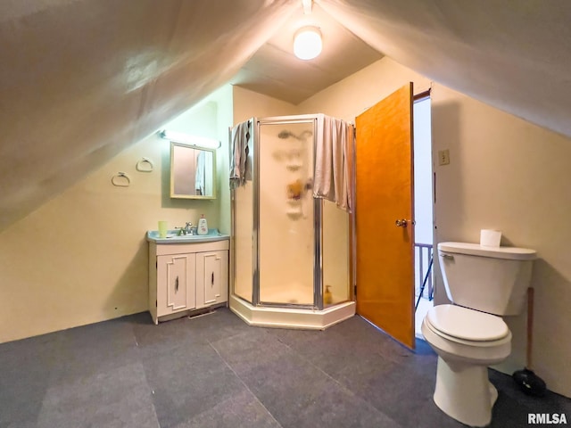 bathroom with lofted ceiling, toilet, vanity, and an enclosed shower