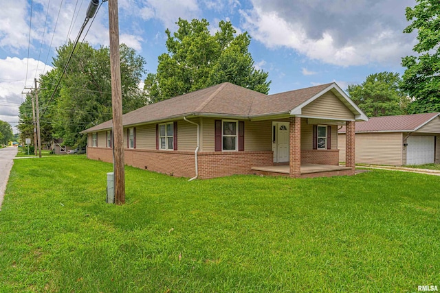 ranch-style house with a porch, a garage, and a front yard