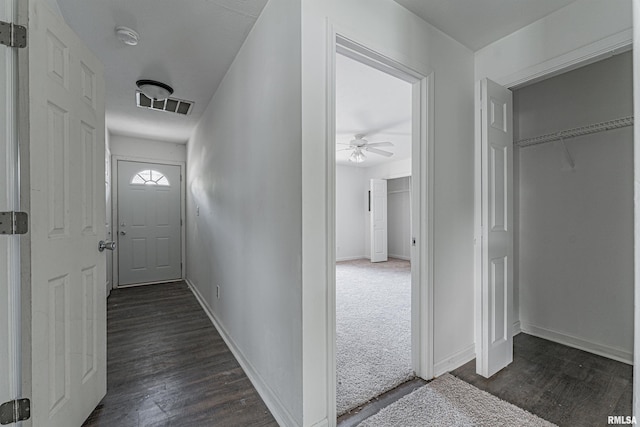 interior space with dark hardwood / wood-style floors