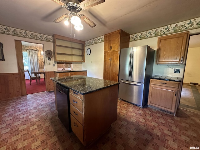 kitchen with a wainscoted wall, freestanding refrigerator, a center island, dishwasher, and open shelves