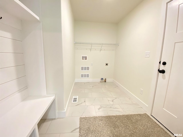 clothes washing area featuring hookup for an electric dryer and washer hookup