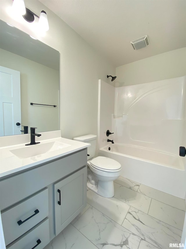 full bathroom with vanity, shower / bath combination, and toilet