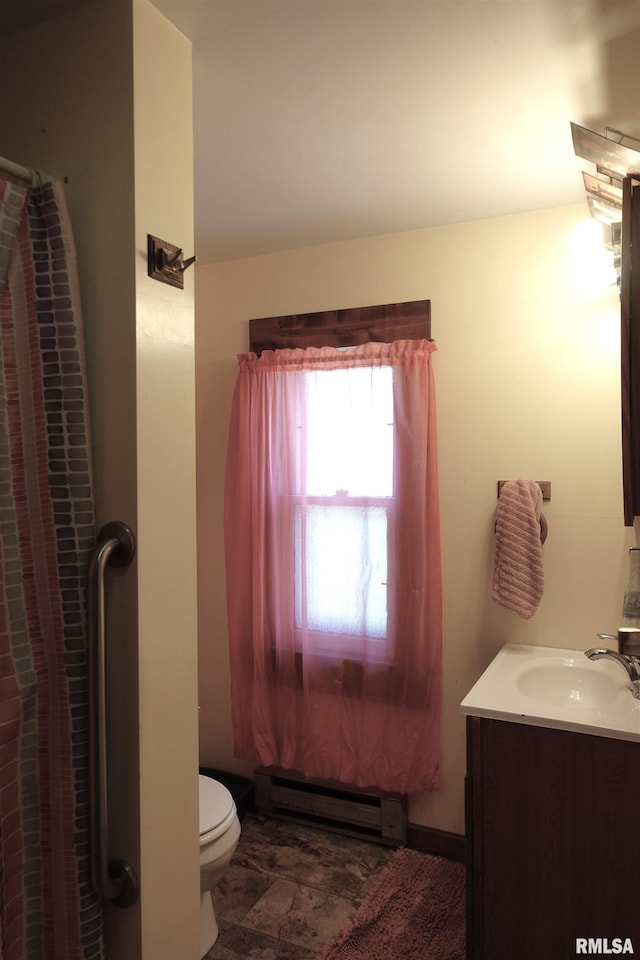 380 Maple Ave, Galesburg, IL 61401 - full bath with a baseboard radiator, vanity, and toilet