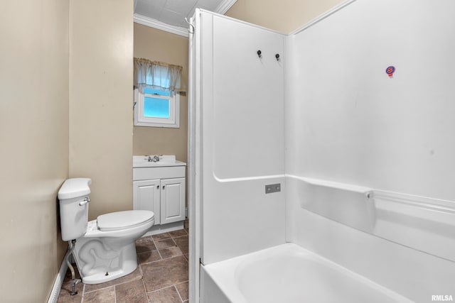 bathroom featuring toilet, vanity, and ornamental molding