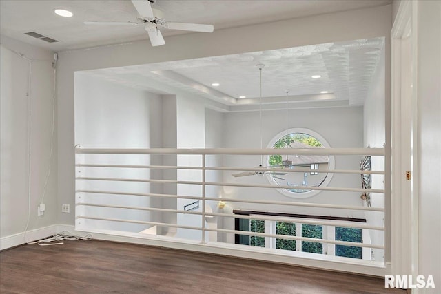 interior space featuring ceiling fan and hardwood / wood-style floors