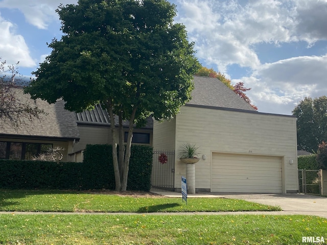 view of side of home with a yard