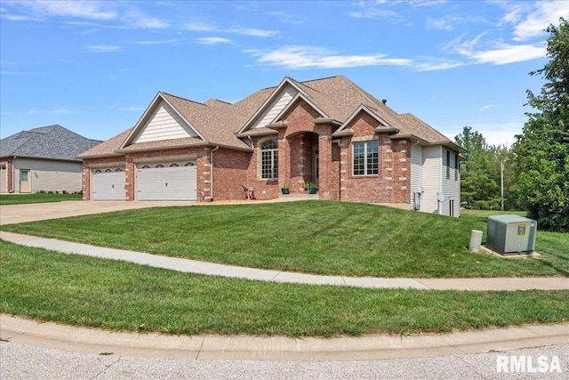 view of front facade featuring a garage and a front yard