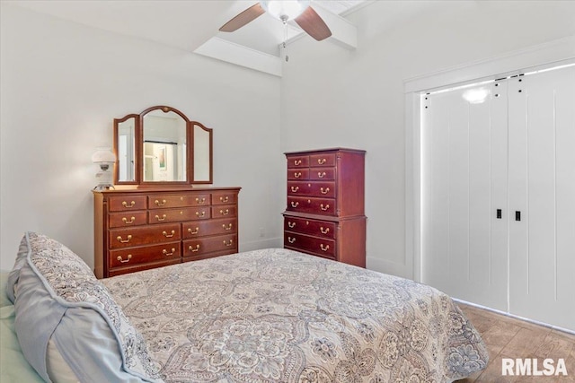 bedroom with ceiling fan and light wood-type flooring