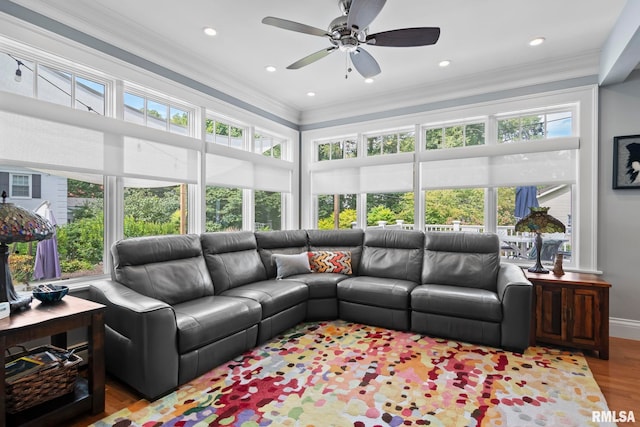 interior space with recessed lighting, wood finished floors, baseboards, and ornamental molding